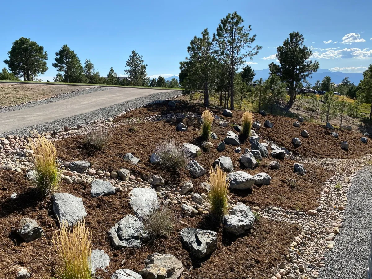 Rock outcropping on mulch